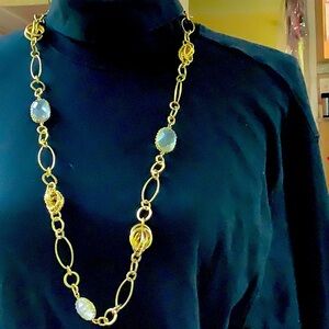 Long lovely costume jewelry gold and crystal necklace.